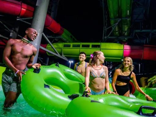 Guests at AquaGlow Pool Party at Aquatica Orlando