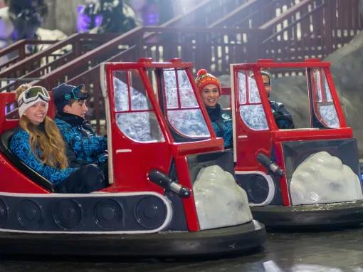 Guests enjoying the bumper cars at Ski Dubai