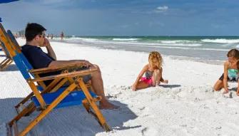 Father and daughtsers enjoying Clearwater Beach