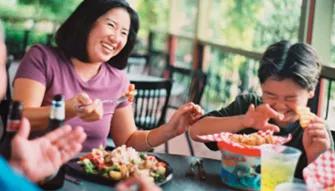 Family enjoying a meal at SeaWorld Orlando