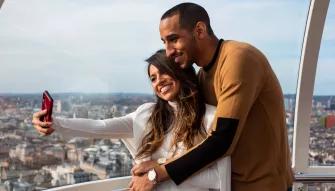 Couple riding on the London Eye