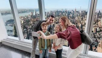 Family enjoying the views at the One World Observatory in New York City