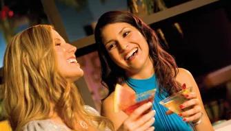 Woman enjoying cocktails at Margaritaville at Universal CityWalk in Orlando