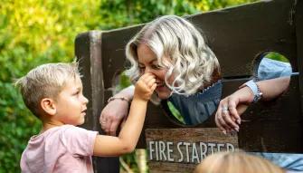 Mother and son enjoying Horrible Histories maze at Warwick Castle