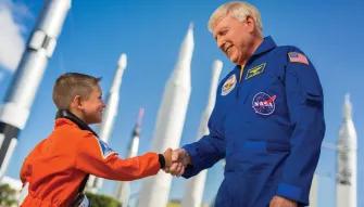 Boy meeting an astronaut at Kennedy Space Center