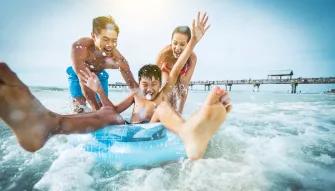 Boys playing on Clearwater Beach in Florida