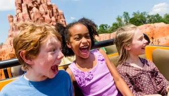 Kids on Big Thunder Mountain Railroad at Magic Kingdom