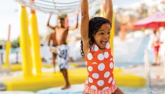 Girl playing in Ski Patrol Training Camp at Disney's Blizzard Beach