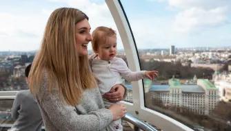 Mother and baby enjoying the views from a London Eye pod