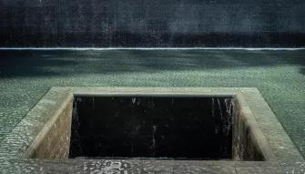 Manmade waterfall set within the footprint of the Twin Towers outside the 9/11 Memorial Museum