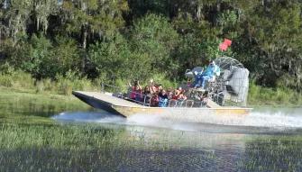 Guests enjoying an airboat ride at Boggy Creek Orlando