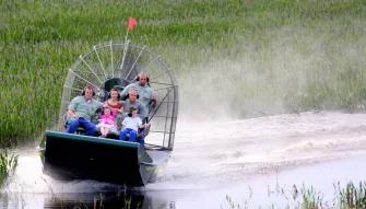 Guests enjoying Florida's natural beauty on a wild florida airboat ride