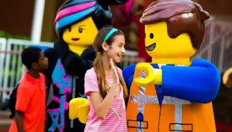 Girl meeting Emmet at LEGOLAND Florida