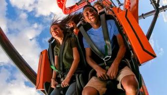 Couple riding Tigris rollercoaster at Busch Gardens Tampa Bay
