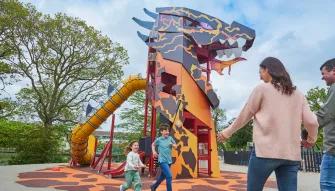 Family in LEGO® MYTHICA’s-themed playground at LEGOLAND Windsor