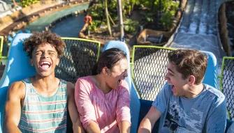 Teens riding Infinity Falls at SeaWorld Orlando