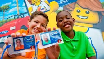 Kids showing off their LEGO driving licenses at LEGOLAND Florida