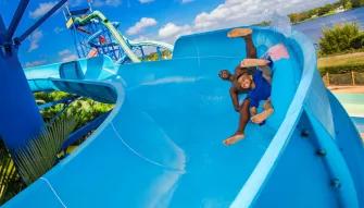 Father and son riding a waterslide at LEGOLAND Florida Water Park
