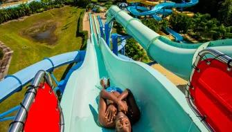 Man riding a water slide at LEGOLAND Florida Water Park