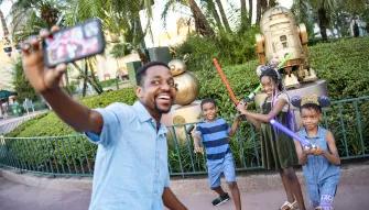 Family taking a selfie at Disney's Hollywood Studios