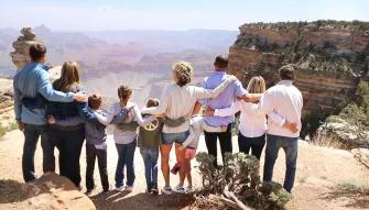 Grand Kingdom and Hummer Tour A group standing on the egde at the Grand Canyon