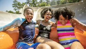 Guests at Miss Adventure Falls, Disney's Typhoon Lagoon Water Park