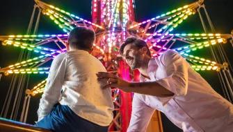 Father and Son in front of Star Flyer at Bollywood Parks Dubai