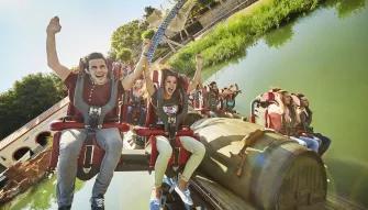 Guests riding Furius Baco at PortAventura theme park