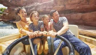 Guests riding Gran Canyon Rapids at PortAventura theme park