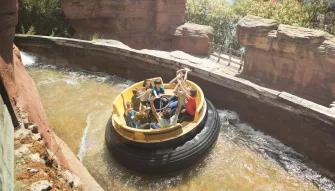 Guests riding Gran Canyon Rapids at PortAventura theme park