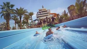 Guest sliding down Hydra Racers at Aquaventure Dubai