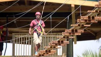 Man on the Screamin’ Gator Zip Line experience at Gatorland