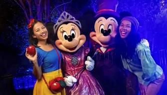 Guests with Mickey and Minnie at Mickey's Not So Scary Halloween Party