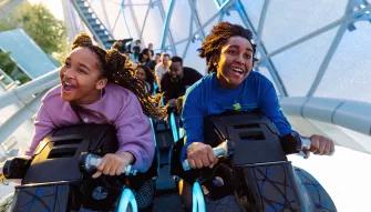 Guests on TRON Lightcycle / Run at Magic Kingdom Park