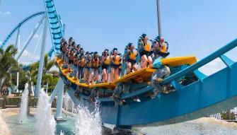 Guests riding Pipeline: The Surf Coaster at SeaWorld Orlando