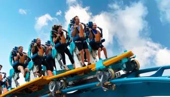 Guests riding Pipeline: The Surf Coaster at SeaWorld Orlando