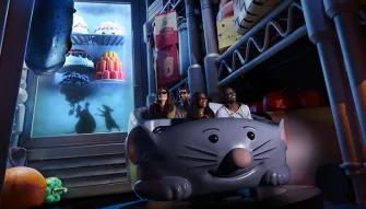 Guests riding Ratatouille: The Adventure