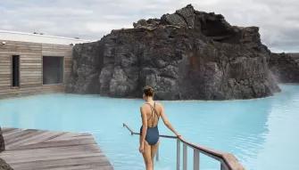 woman-walking-into-pool