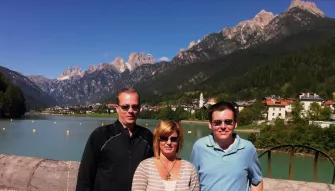 people-by-lake-and-mountain