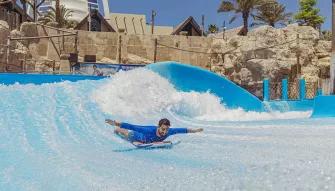 Man on Wipeout & Riptide Flowrider, Wild Wadi Waterpark in Dubai