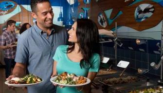 Guests enjoying Dine With Orcas Experience at Seaworld Orlando