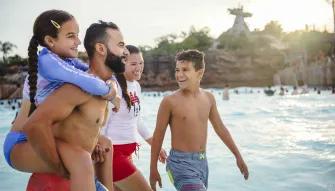 Guests in wave pool, Disney H2O Glow Nights at Disney’s Typhoon Lagoon