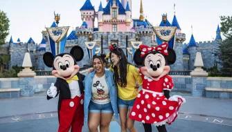 Guests with Mickey and Minnie at Disneyland California