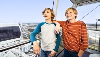 Boys inside an Orlando Eye Capsule