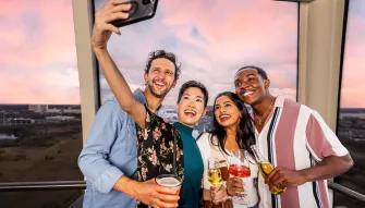 Group selfie inside an Orlando Eye Capsule