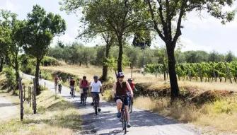group-riding-through-tuscany