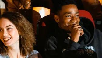 couple-enjoying-comedy