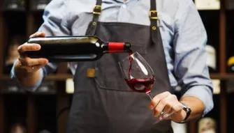 person-pouring-wine