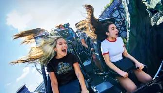 Guests on Jurassic World VelociCoaster at Universal Islands of Adventure