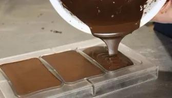 pouring-chocolate-into-moulds